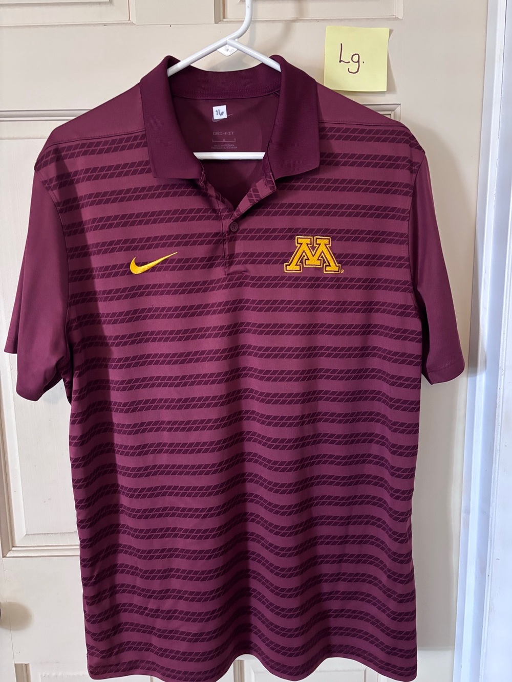 Nike Dri-Fit polo shirt featuring MINNESOTA GOLDEN GOFERS